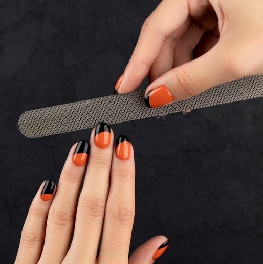 Orangeand black nail art Las Vegas nail salon